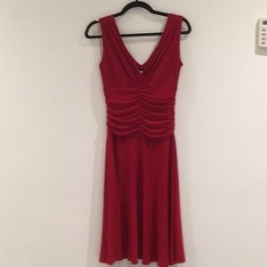 New without tags. Red dress by Tiana B.